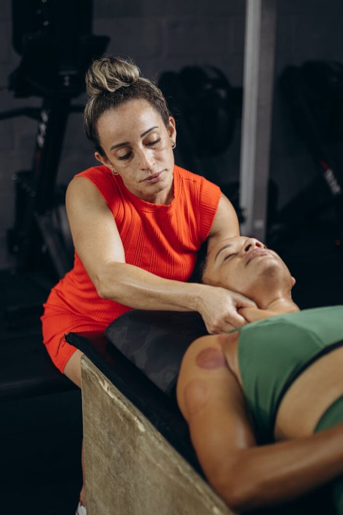 A woman is getting a massage on her back